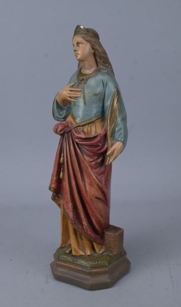 Saint holding a quill, polychrome plaster...