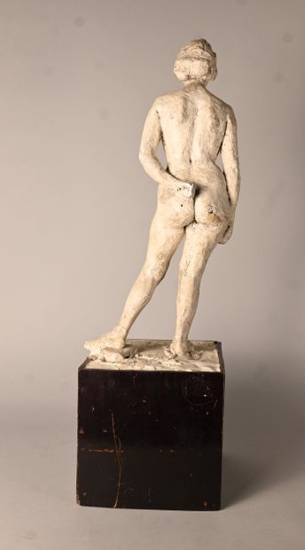 Modernist sculpture of a female nude on a...