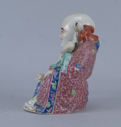 Bouddha rieur entouré d’enfants en porcelaine...