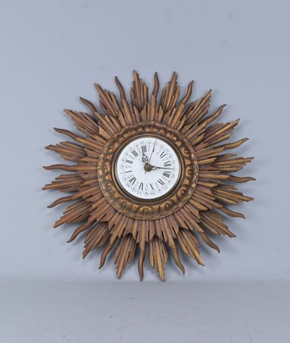 Sun-shaped wall clock in gilded wood, early...