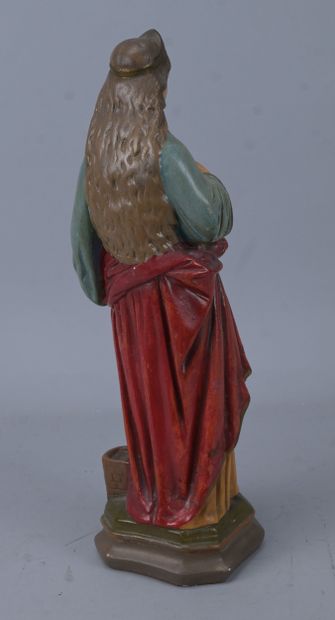Saint holding a quill, polychrome plaster...