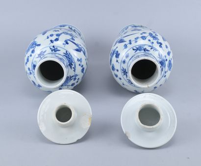 Pair of lidded blue-and-white porcelain vases,...