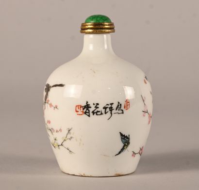 Porcelain snuff bottle decorated with prunus...
