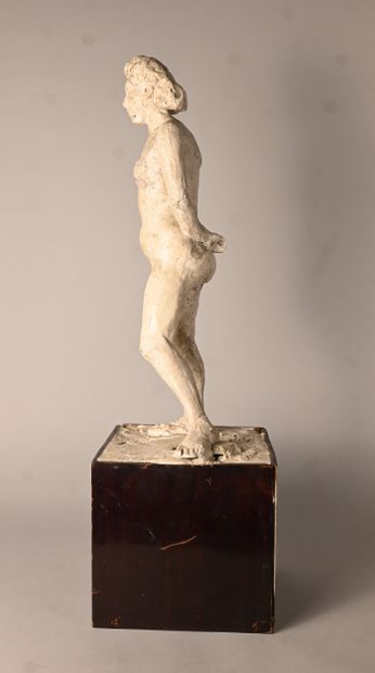 Modernist sculpture of a female nude on a...