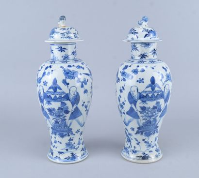 Pair of lidded blue-and-white porcelain vases,...
