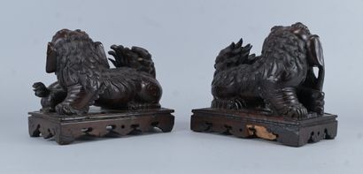 Pair of Buddhist guardian lions carved from...