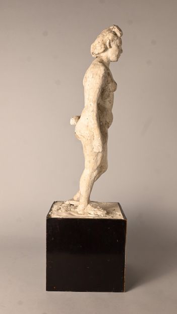 Modernist sculpture of a female nude on a...