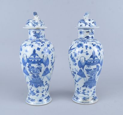 Pair of lidded blue-and-white porcelain vases,...