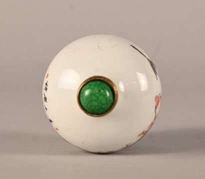 Porcelain snuff bottle decorated with prunus...