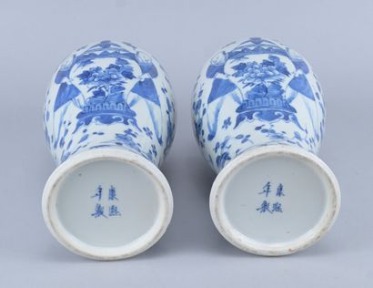 Pair of lidded blue-and-white porcelain vases,...