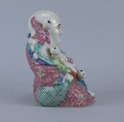 Bouddha rieur entouré d’enfants en porcelaine...