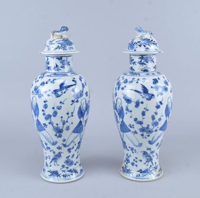 Pair of lidded blue-and-white porcelain vases,...