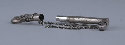 Silver needle case in the shape of a key...