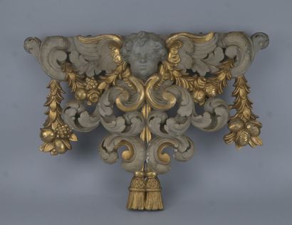 Ornement baroque en bois sculpté et doré...