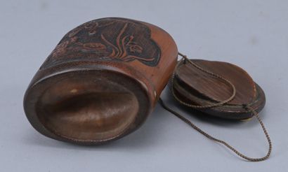 Carved bamboo tonkotsu, Japan, 19th century

Japanese...