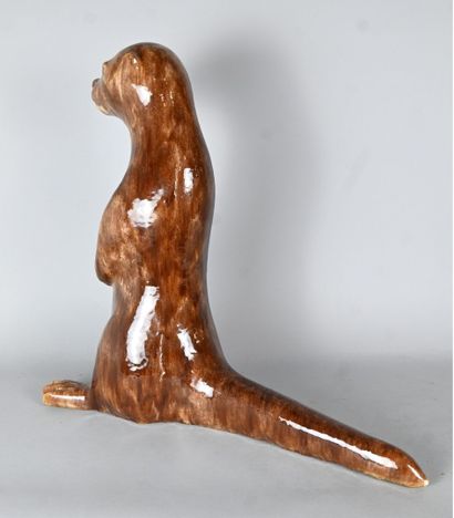Glazed stoneware animal sculpture depicting...