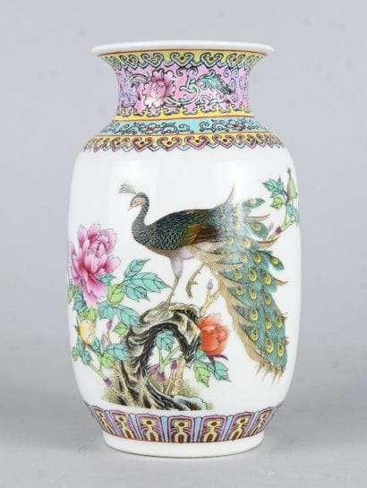 Chinese porcelain vase with peacock and peony...