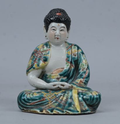 Seated Buddha in polychrome glazed porcelain,...