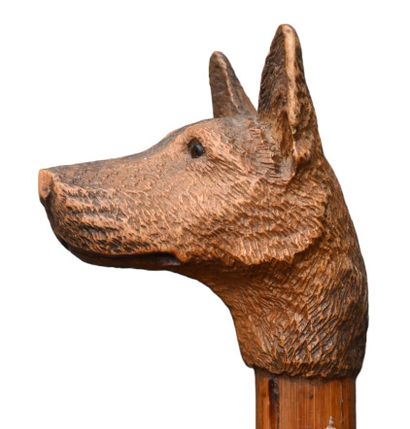 Carved wooden cane with dog head handle,...