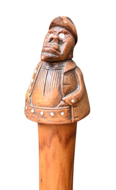 Walking stick with carved tagua nut handle,...