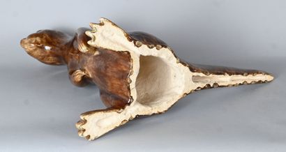 Glazed stoneware animal sculpture depicting...