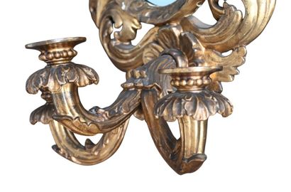 Pair of carved and gilded wood girandole...
