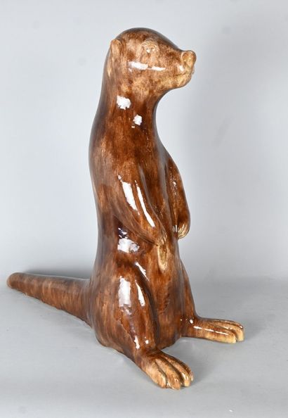 Glazed stoneware animal sculpture depicting...