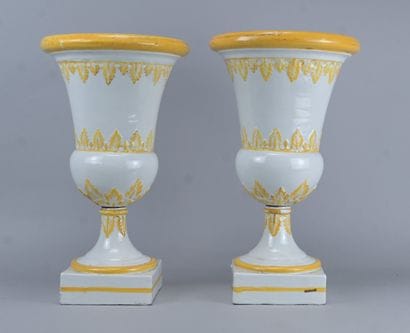 A pair of apothecary vases made of white...