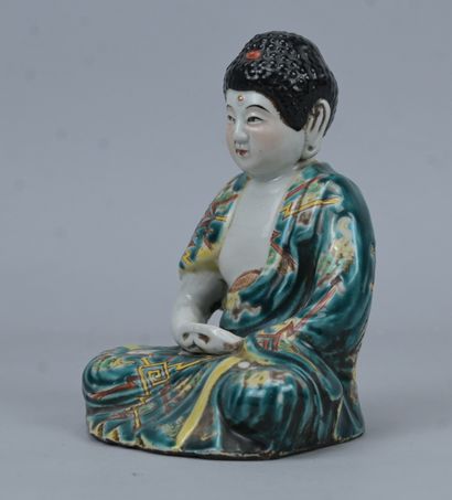 Seated Buddha in polychrome glazed porcelain,...