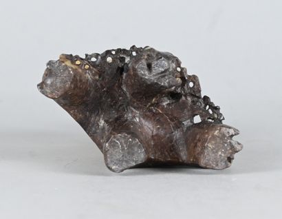 Openwork soapstone floral sculpture on base...