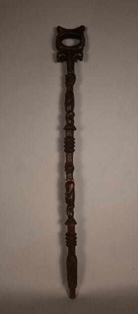 Yaka stick with two carved figures, first...