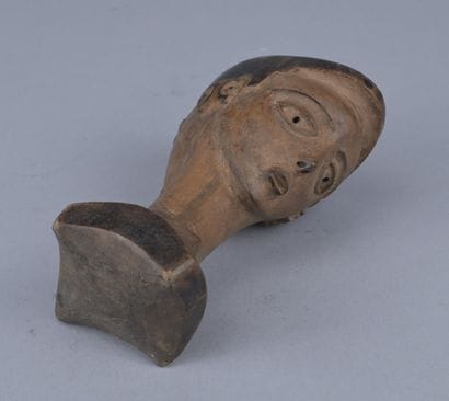 Anthropomorphic Kuba Cup, Congo, 20th century

A...