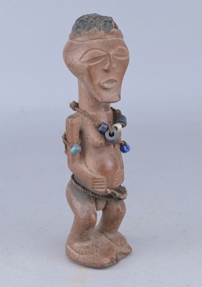 Songye Female Figure with Beads, Congo

A...
