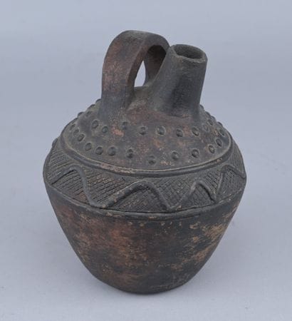 Cruche en terre cuite Kongo, début XXe siècle

Cruche...