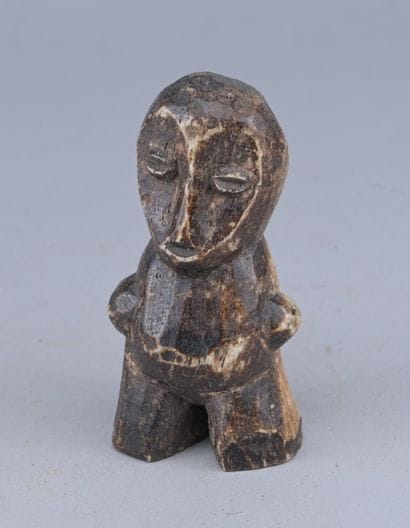 Lega Bone Statuette, Congo

A small anthropomorphic...