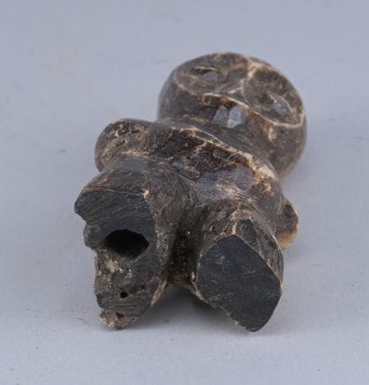 Lega Bone Statuette, Congo

A small anthropomorphic...