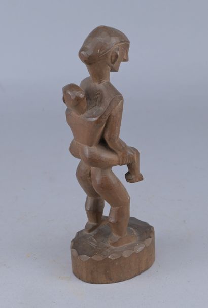 Ifugao Wooden Maternity Sculpture, Philippines

A...