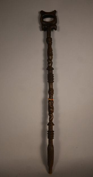 Yaka stick with two carved figures, first...