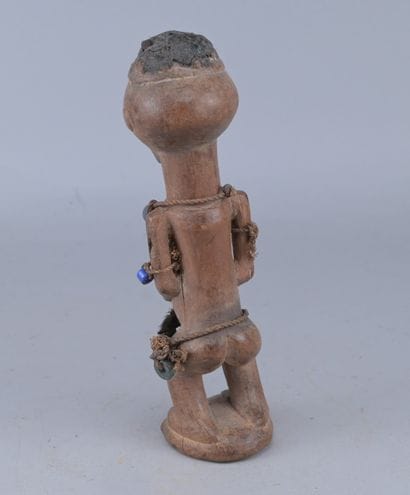 Songye Female Figure with Beads, Congo

A...