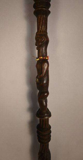 Yaka stick with two carved figures, first...