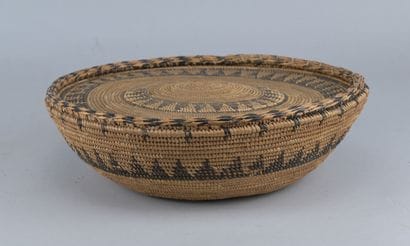 Tutsi Basket with Lid, Rwanda

A covered...