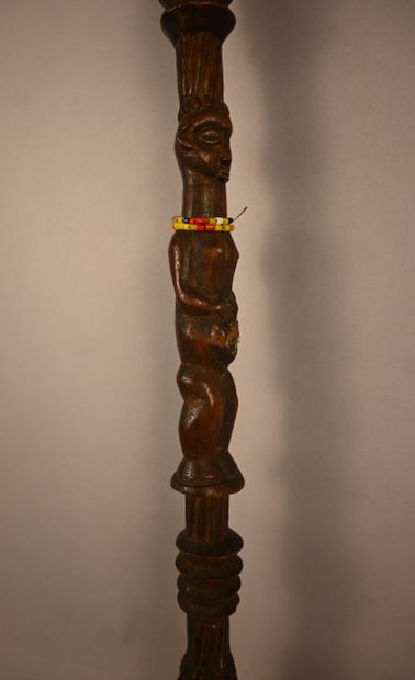 Yaka stick with two carved figures, first...