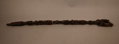 Yaka stick with two carved figures, first...