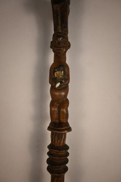 Yaka stick with two carved figures, first...