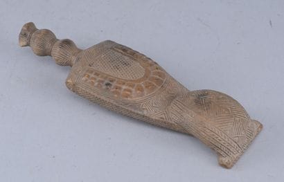 Baule pendant in the form of a knife in its...