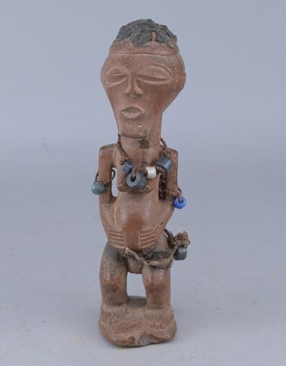 Songye Female Figure with Beads, Congo

A...
