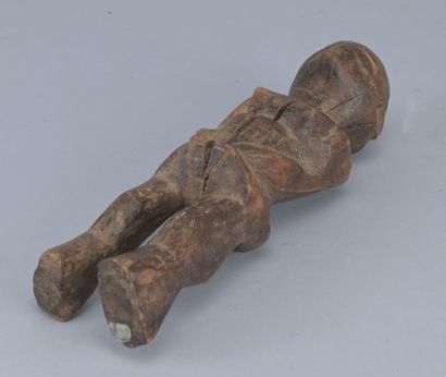 Lobi Wooden Female Figure, 20th century

A...