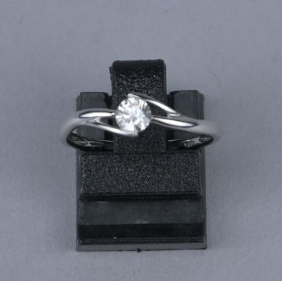 18K white gold solitaire ring with a diamond

18-karat...