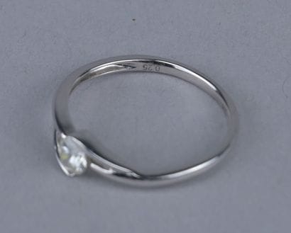 18K white gold solitaire ring with a diamond

18-karat...