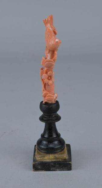 Chinese Red Coral Sculpture on a Base

A...